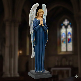 Hand-painted fiberglass resin statue of a somber angel in a reflective standing pose.