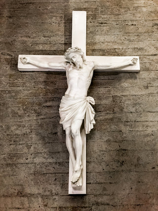 Large fiberglass resin corpus of Christ with arms extended, in a traditional crucifixion pose. — alternate view