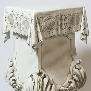 Fiberglass resin pedestal with a draped column design resting on a claw-shaped foot — alternate view