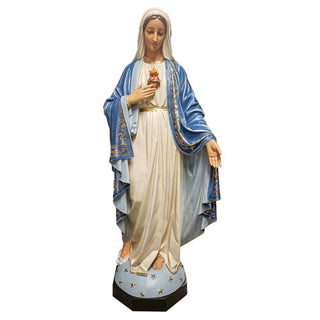 Tall hand-painted statue of the Blessed Mother with one hand outstretched, standing outdoors. — alternate view