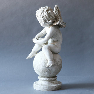 Fiberglass resin angel statue standing upright, sixteen inches tall, shown in a plain setting. — detail view