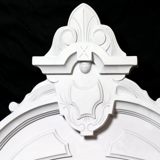 Cortland over door architectural piece in fiberglass resin with a low-relief traditional design — detail view