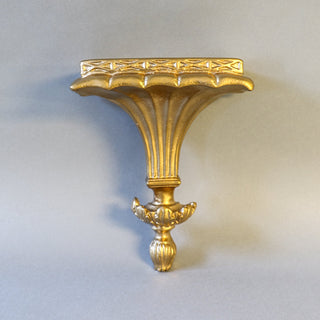 Small wall-mounted bracket in fiberglass resin, shown unpainted, for holding a statue or planter. — alternate view