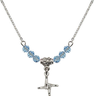 18" Rhodium Plated Necklace with 4mm Aqua Crystal Beads featuring a Sterling Silver Saint Brigid Cross Medal.