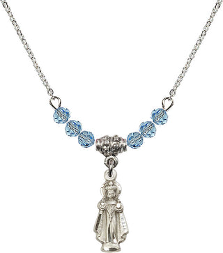 18" Rhodium Plated Necklace with 4mm Aqua Crystal Beads featuring a Sterling Silver Infant of Prague Medal.