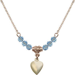 18" Hamilton Gold Plated Necklace with 4mm Aqua Crystal Beads featuring a 14kt Gold Filled Heart Medal.