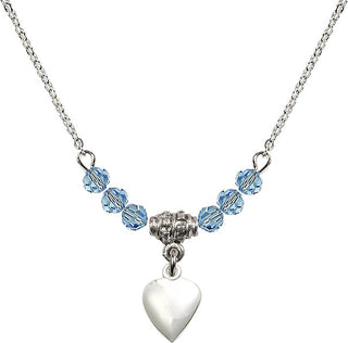18" Rhodium Plated Necklace with 4mm Aqua Crystal Beads featuring a Sterling Silver Heart Medal.