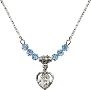 18" Rhodium Plated Necklace with 4mm Aqua Crystal Beads featuring a Sterling Silver Our Lady of Guadalupe Medal.