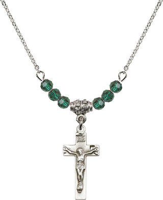 18" Rhodium Plated Necklace with 4mm Emerald Crystal Beads featuring a Sterling Silver Crucifix Medal.