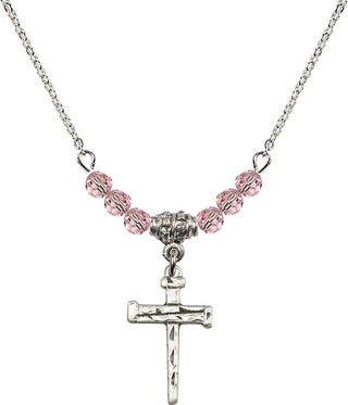 18" Rhodium Plated Necklace with 4mm Light Rose Crystal Beads featuring a Sterling Silver Nail Cross Medal.