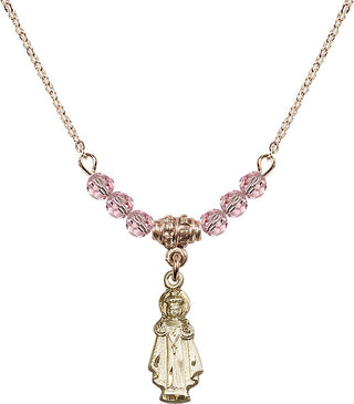 18" Hamilton Gold Plated Necklace with 4mm Light Rose Crystal Beads featuring a 14kt Gold Filled Infant of Prague Medal.