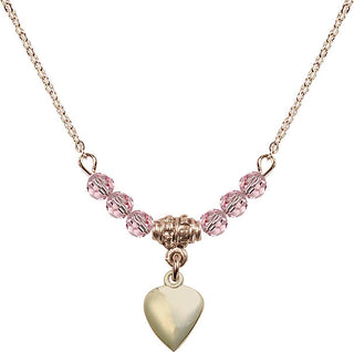 18" Hamilton Gold Plated Necklace with 4mm Light Rose Crystal Beads featuring a 14kt Gold Filled Heart Medal.