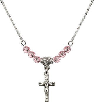 18" Rhodium Plated Necklace with 4mm Light Rose Crystal Beads featuring a Sterling Silver Crucifix Medal.