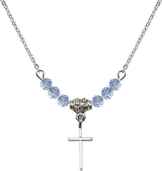 18" Rhodium Plated Necklace with 4mm Light Sapphire Crystal Beads featuring a Sterling Silver Cross Medal.