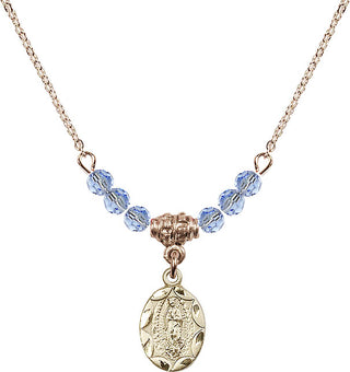 18" Hamilton Gold Plated Necklace with 4mm Light Sapphire Crystal Beads featuring a 14kt Gold Filled Our Lady of Guadalupe Medal.