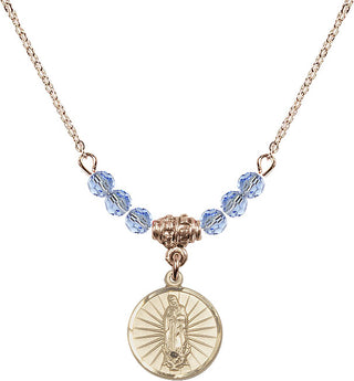 18" Hamilton Gold Plated Necklace with 4mm Light Sapphire Crystal Beads featuring a 14kt Gold Filled Our Lady of Guadalupe Medal. Engraved Catholic Saint Jewelry
