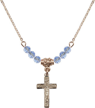 18" Hamilton Gold Plated Necklace with 4mm Light Sapphire Crystal Beads featuring a 14kt Gold Filled Crucifix Medal.