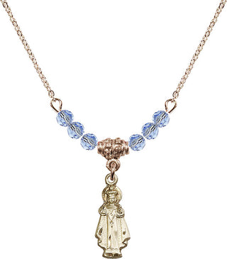 18" Hamilton Gold Plated Necklace with 4mm Light Sapphire Crystal Beads featuring a 14kt Gold Filled Infant of Prague Medal.