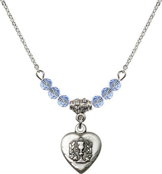 18" Rhodium Plated Necklace with 4mm Light Sapphire Crystal Beads featuring a Sterling Silver Heart / Communion Medal.