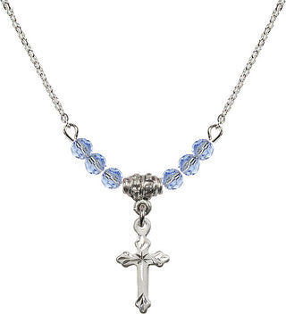 18" Rhodium Plated Necklace with 4mm Light Sapphire Crystal Beads featuring a Sterling Silver Cross Medal.