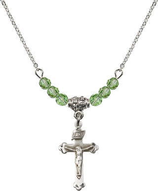 18" Rhodium Plated Necklace with 4mm Peridot Crystal Beads featuring a Sterling Silver Crucifix Medal.