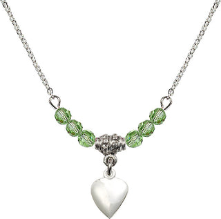 18" Rhodium Plated Necklace with 4mm Peridot Crystal Beads featuring a Sterling Silver Heart Medal.