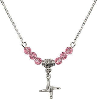 18" Rhodium Plated Necklace with 4mm Rose Crystal Beads featuring a Sterling Silver Saint Brigid Cross Medal.