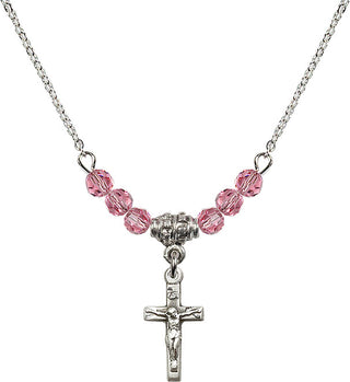 18" Rhodium Plated Necklace with 4mm Rose Crystal Beads featuring a Sterling Silver Crucifix Medal.