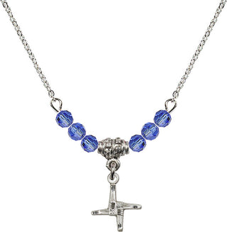 18" Rhodium Plated Necklace with 4mm Sapphire Crystal Beads featuring a Sterling Silver Saint Brigid Cross Medal.