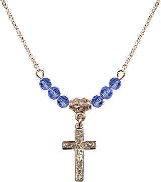 18" Hamilton Gold Plated Necklace with 4mm Sapphire Crystal Beads featuring a 14kt Gold Filled Crucifix Medal.