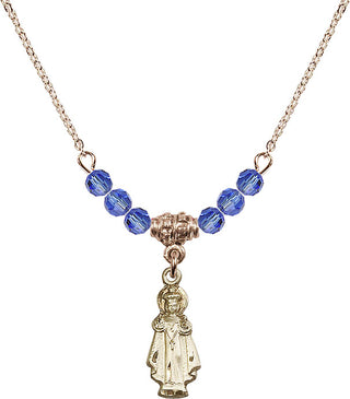 18" Hamilton Gold Plated Necklace with 4mm Sapphire Crystal Beads featuring a 14kt Gold Filled Infant of Prague Medal.