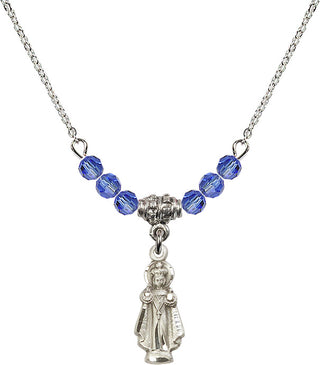18" Rhodium Plated Necklace with 4mm Sapphire Crystal Beads featuring a Sterling Silver Infant of Prague Medal.