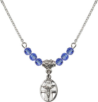 18" Rhodium Plated Necklace with 4mm Sapphire Crystal Beads featuring a Sterling Silver Crucifix Medal.