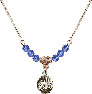 18" Hamilton Gold Plated Necklace with 4mm Sapphire Crystal Beads featuring a 14kt Gold Filled Shell Medal.