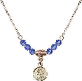 18" Hamilton Gold Plated Necklace with 4mm Sapphire Crystal Beads featuring a 14kt Gold Filled Saint Christopher Medal.