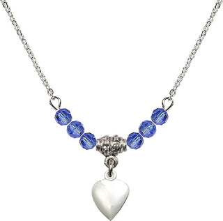 18" Rhodium Plated Necklace with 4mm Sapphire Crystal Beads featuring a Sterling Silver Heart Medal.