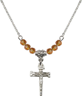 18" Rhodium Plated Necklace with 4mm Topaz Crystal Beads featuring a Sterling Silver Nail Crucifix Medal.