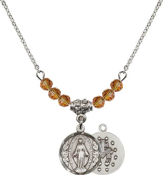 18" Rhodium Plated Necklace with 4mm Topaz Crystal Beads featuring a Sterling Silver Miraculous Medal.