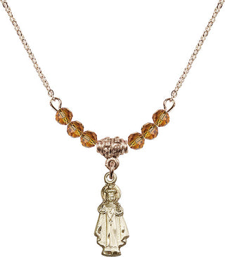 18" Hamilton Gold Plated Necklace with 4mm Topaz Crystal Beads featuring a 14kt Gold Filled Infant of Prague Medal.