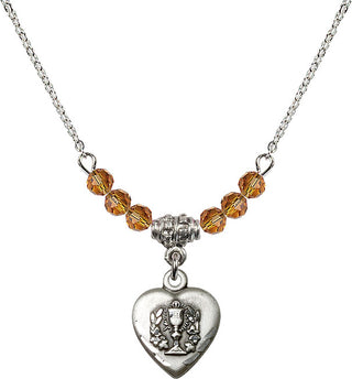 18" Rhodium Plated Necklace with 4mm Topaz Crystal Beads featuring a Sterling Silver Heart / Communion Medal.