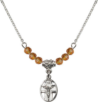 18" Rhodium Plated Necklace with 4mm Topaz Crystal Beads featuring a Sterling Silver Crucifix Medal.