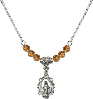 18" Rhodium Plated Necklace with 4mm Topaz Crystal Beads featuring a Sterling Silver Miraculous Medal.