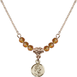 18" Hamilton Gold Plated Necklace with 4mm Topaz Crystal Beads featuring a 14kt Gold Filled Saint Christopher Medal.