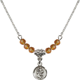 18" Rhodium Plated Necklace with 4mm Topaz Crystal Beads featuring a Sterling Silver Saint Christopher Medal.