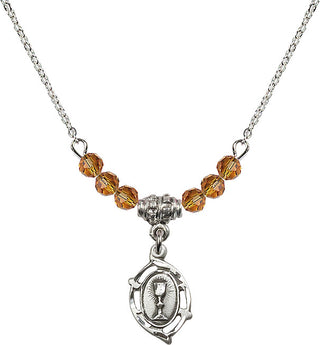 18" Rhodium Plated Necklace with 4mm Topaz Crystal Beads featuring a Sterling Silver Communion Medal.