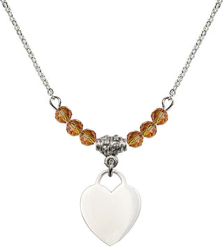 18" Rhodium Plated Necklace with 4mm Topaz Crystal Beads featuring a Sterling Silver Heart Medal. Engraved Catholic Saint Jewelry