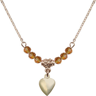 18" Hamilton Gold Plated Necklace with 4mm Topaz Crystal Beads featuring a 14kt Gold Filled Heart Medal.