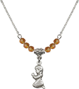 18" Rhodium Plated Necklace with 4mm Topaz Crystal Beads featuring a Sterling Silver Praying Girl Medal.