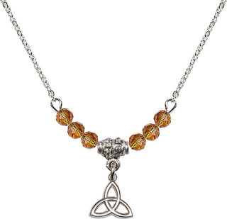 18" Rhodium Plated Necklace with 4mm Topaz Crystal Beads featuring a Sterling Silver Trinity Irish Knot Medal.