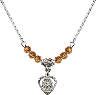 18" Rhodium Plated Necklace with 4mm Topaz Crystal Beads featuring a Sterling Silver Miraculous Medal.